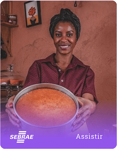 a woman holding a bowl of food