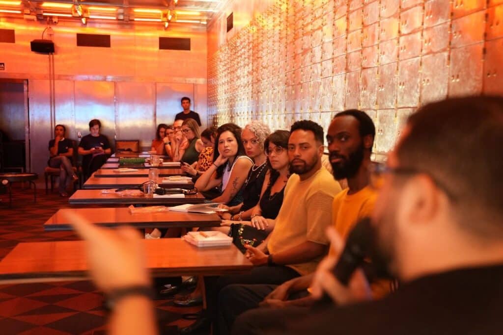 a group of people sitting at tables